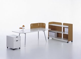 ATM Desk (2002) for Vitra<br><br>A far cry from the standard-issue functional, flaccid cubicle, Morrison’s ATM Desk brought stylish curves and wooden accents to the modular office life.<br><br>Photos: Hans Hansen, Vitra
