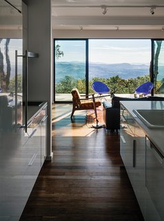 This Northern California Prefab Gets a Dose of Universal Design - Photo 4 of 8 - Stott and Levy used Teragren bamboo flooring and Milgard sliding glass doors. "Universal design isn’t just for older people," the daughter says about the single-story layout and zero-step entries. "If you don’t need steps, don’t have them."
