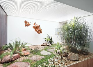 Blockbuster Movies Can't Compete with These Monumental Views - Photo 7 of 9 - A small interior courtyard features a huge skylight and the sculpture Air-Port-City/Cloud-City/ 14-5-4 Cloud Modules 30 Net by Tomás Saraceno.