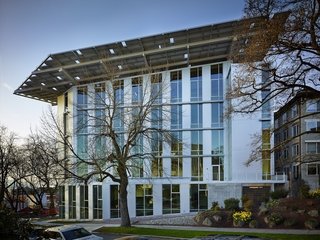 Bullitt Center (Seattle, Washington: 2013)<br><br>Denis Hayes, chief executive of the Bullitt Foundation, said that if the Bullit Center, his organization’s ambitious experiment in creating a sustainable and "living" office building, is still the greenest space of its kind in a decade, it will have been a failure. That’s not bragging, that’s merely an insight into the scope and ambition of this revolutionary structure, a testing ground for water and energy self sufficiency (via rainwater collection, composting, and a large solar array) aiming to be a case study for radical change in how we build. Based on stats released on Earth Day in April, the building’s first anniversary, the structure is currently using 75 percent less energy than a similar structure and is on its way to a net zero energy certification. <br><br>Photo by Benjamin Benschneider