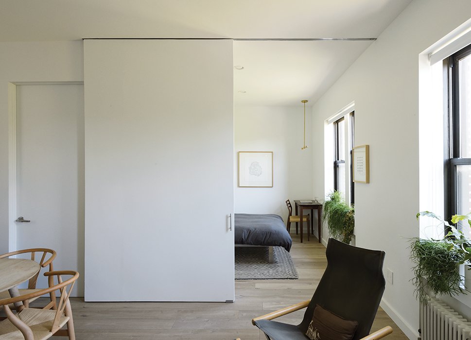 resource furniture murphy bed flat screen tv modern brooklyn apartment has seamless sliding door that separates the master bedroom and living room resource furniture clei penelope wall bed by dwell resource furniture murphy bed flat screen tv modern brooklyn apartment has seamless sliding door that separates the master bedroom and living room resource furniture clei penelope wall bed by dwell