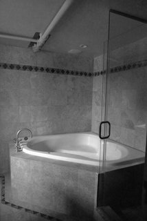 This Cozy Home Totally Changes How We Think of Tribeca Lofts - Photo 5 of 9 - A before shot of the tub.