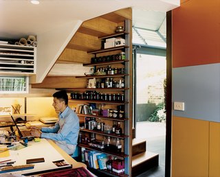 Langston-Jones works tucked in his office beneath the stairs.