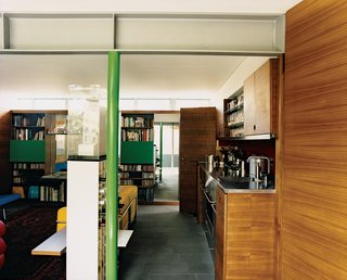 American walnut veneer covers the cabinets in the kitchen.