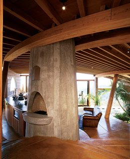 Big Sur: Coastal Commissions - Photo 1 of 9 - The interiors of many of Muennig’s houses emphasize natural building materials such <br><br>as wood, concrete, and stone. Plant life and nature are intrinsic to the Pfeiffer Ridge House IV.