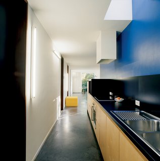 The Tree of Ghent - Photo 4 of 11 - The kitchen is a vibrant deep blue. "It's the same color Le Corbusier used in the corridor of his Villa Savoye in Poissy," Van Everbroeck reports.