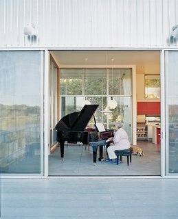 The architects built the house around Madeline’s grand Schimmel piano. But that’s not to say the pair wanted to live in a concert hall. Having a flexible living space and accommodating recital guests took priority.