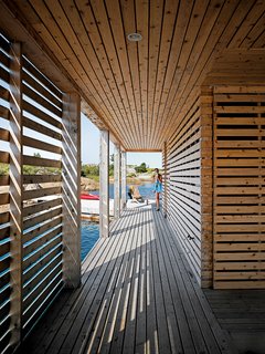 Outdoor corridors allow the Worples to walk through the house and across the cove without going inside.