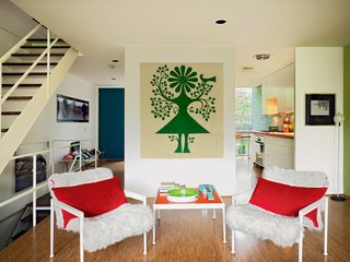 Mies van der Rohe, Lafayette Park - Photo 7 of 12 - A Richard Schultz outdoor set for Knoll looks at home indoors thanks to some faux fur, and an Alexander Girard Environmental Enrichment panel does its job on the rear wall.