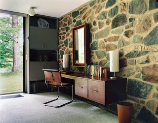 Marcel Breuer Hooper House II - Photo 5 of 9 - Although the house was refurbished before North bought it in 1996, it still includes some of Breuer's original built-in furniture, including the desk in the bedroom, as well as a chair designed by the architect.