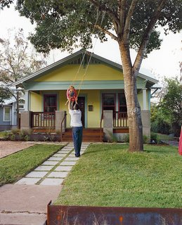Double Time - Photo 2 of 7 - Blake Trabulsi dressed up the front yard by adding bright colors to the 1930s facade.