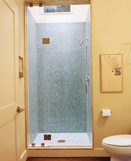 Double Time - Photo 6 of 7 - The office adjoins a light-filled guest bathroom.