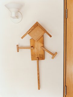 In the bedroom, a "scarecrow" crafted by the Goodmans' grandson Eli hangs on the wall.