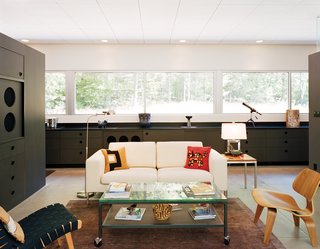 Industrial Revolution - Photo 5 of 7 - The house has become a showcase for Cook and Compa's collection of modern furniture, including several Eames chairs and a Jens Risom chair for Knoll.
