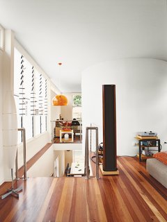 The black column in his living room is not a mysterious monolith, but one of his speakers.