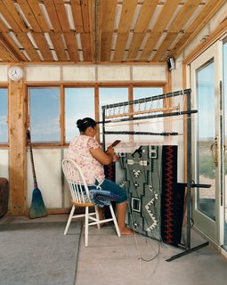 No Grid in Sight - Photo 5 of 8 - Rosie Joe weaves a traditional Navajo rug.