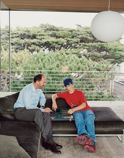 This Surfer's Beach House is More Than It Seems - Photo 6 of 13 - When not surfing, Lloyd-Butler and his son John repose in the new addition over a game of backgammon.