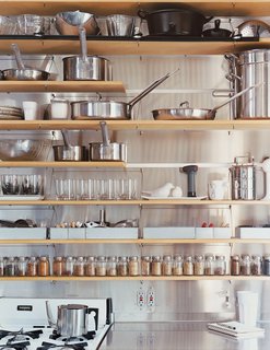 Modern Mixed Use in San Diego - Photo 8 of 11 - The kitchen shelves are organized with clinical precision.