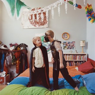 Moe and Lewis play in their shared bedroom, the former Madame Wong’s kitchen. "It’s just so fun for them to live in a funny place like this," says Amy. "Their friends love to come over and play."