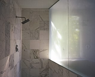 The bathroom features a rain showerhead available at Home Depot Expo. p. 194