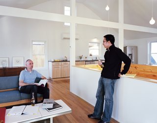 Schenk and Kaewlai on the second floor of Large, where Schenk eliminated the attic and several walls to create a more fluid and open space.