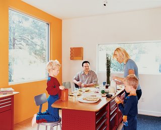 The kitchen island is fashioned from the Waterloo Shop Series tool chests from Home Depot.