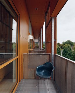 Community Building - Photo 3 of 10 - Wire-mesh balconies provide a perfect perch to enjoy the mornings, afternoons, and evenings while floor-to-ceiling glass helps fill all the units at the Belmont with plenty of natural light.