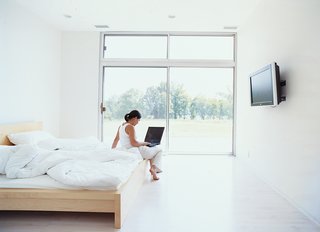 The LV’s master bedroom has direct outdoor access, like every other room in the house. Bed by IKEA.