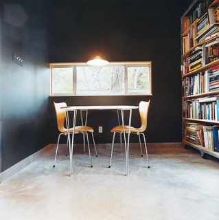 These 3107 chairs and Superellipse table are from Fritz Hansen.