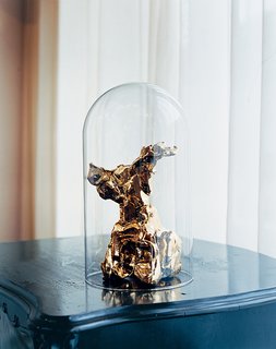 Marcel Wanders - Photo 3 of 11 - A gold-plated One Minute sculpture, under an antique glass dome.