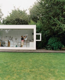 Phillips designed Judith a stark white, glass-fronted art studio.