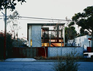 Solar Inspiration - Photo 8 of 8 - Brooks and Scarpa took an unlovable old bungalow that occupied a deep through lot, with streets front and rear, and transformed it into their dream home. The ingenious new solar-framed façade is seen here.