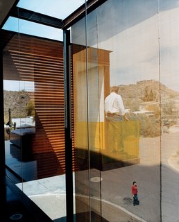 The woven wire steel mesh used to cloak Xeros’s east façade stands in stark contrast to Phoenix’s blue sky and the palo brea planted along the street.