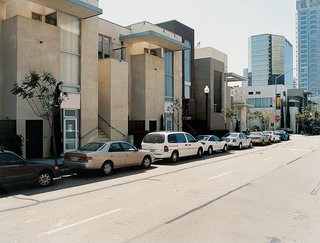 Architect and developer Jonathan Segal's "convertible units" are one-bedroom rental apartments with hydraulic lifts in their single-car garages, which allow two cars to be parked in one space.