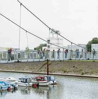 Features like the elegant Movable Bridge invite pedestrians to linger on the waterfront.