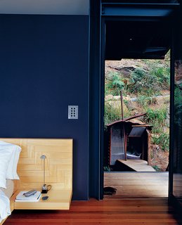 Three Glass-and-Copper Pavilions Conquer the Cliffs - Photo 8 of 10 - Caroline Casey designed the bed and built-ins in the master bedroom.