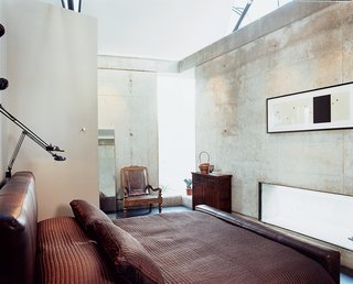 The custom leather platform bed was designed by Shikany’s firm, PS Studios.