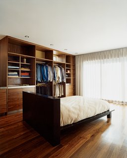 The master bedroom. "The small size of the home inspired me to design it as an urban retreat for casual living based on radical simplicity," says architect Cass Calder Smith.