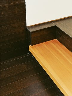 Gaffney House Dining Room - Photo 8 of 10 - Fir stair treads are cantilevered off the wall with a custom steel support to create an industrial look.