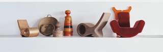 A lineup of Pakhalé’s working models, including two prototype versions of the Fish chair, designed for Cappellini. The simple forms are used to dramatic effect when the materials vary, from Corian to bent glass.