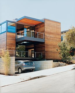 The house, complete with Glenn’s Toyota Prius.