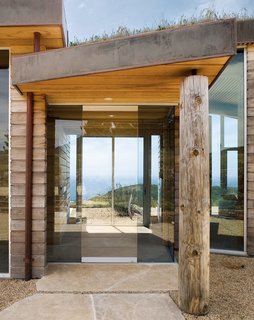 Big Sur: Going Coastal - Photo 5 of 6 - Native grasses, large wood timbers, and plentiful amounts of stone help maintain the sense of "living close to nature" that the Treadwells desired.