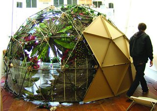 A close-up of a custom blown- glass terrarium offers a microcosmic view of one of Hayes’s lushly overgrown landscapes. Hayes produces her silicone planters in five sizes, two styles ("classic" and "eccentric"), and five standard color options.