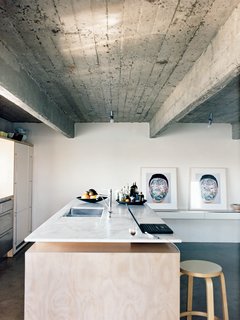 On the main floor, the kitchen islandis like Zulaikha’s own version of a Donald Judd sculpture: minimal, freestanding, and geometric.