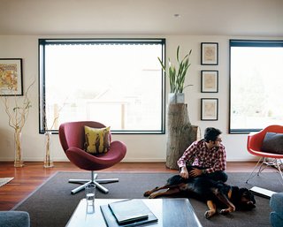 White says of the living room, "We just blew it wide open," removing walls to create a bright, continuous space.
