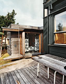 The master-bedroom addition juts forth like a prow of a ship.