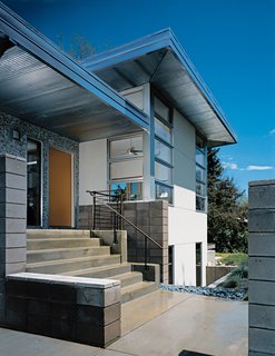 Inspired by a project Brandy LeMae saw in San Francisco, the front entry is covered in glass mosaic tiles and "brings a little bit of California to Colorado."