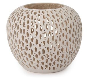 These intricately detailed oval-shaped candleholders are made by hand from Brazilian white clay. When a tea light is lit inside, the openings in the surface of the candleholder cast patterns and shadows on the wall round it. MoMA Exclusive. Small Oval: 2 ½" h x 3 ½" diam., $45 Small Vase: 3 ½" h x 1 1/3" diam. $48 Large Oval: 3 ½" h x 4" diam. $65