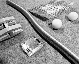 The objects on Sobek's desk illustrate his varied interests and highlight his belief that design and engineering should be interconnected.