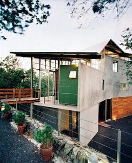 Welcome to the Jungle - Photo 2 of 8 - Banks of windows and translucent panels help keep Casa Tuscania nice and airy.
